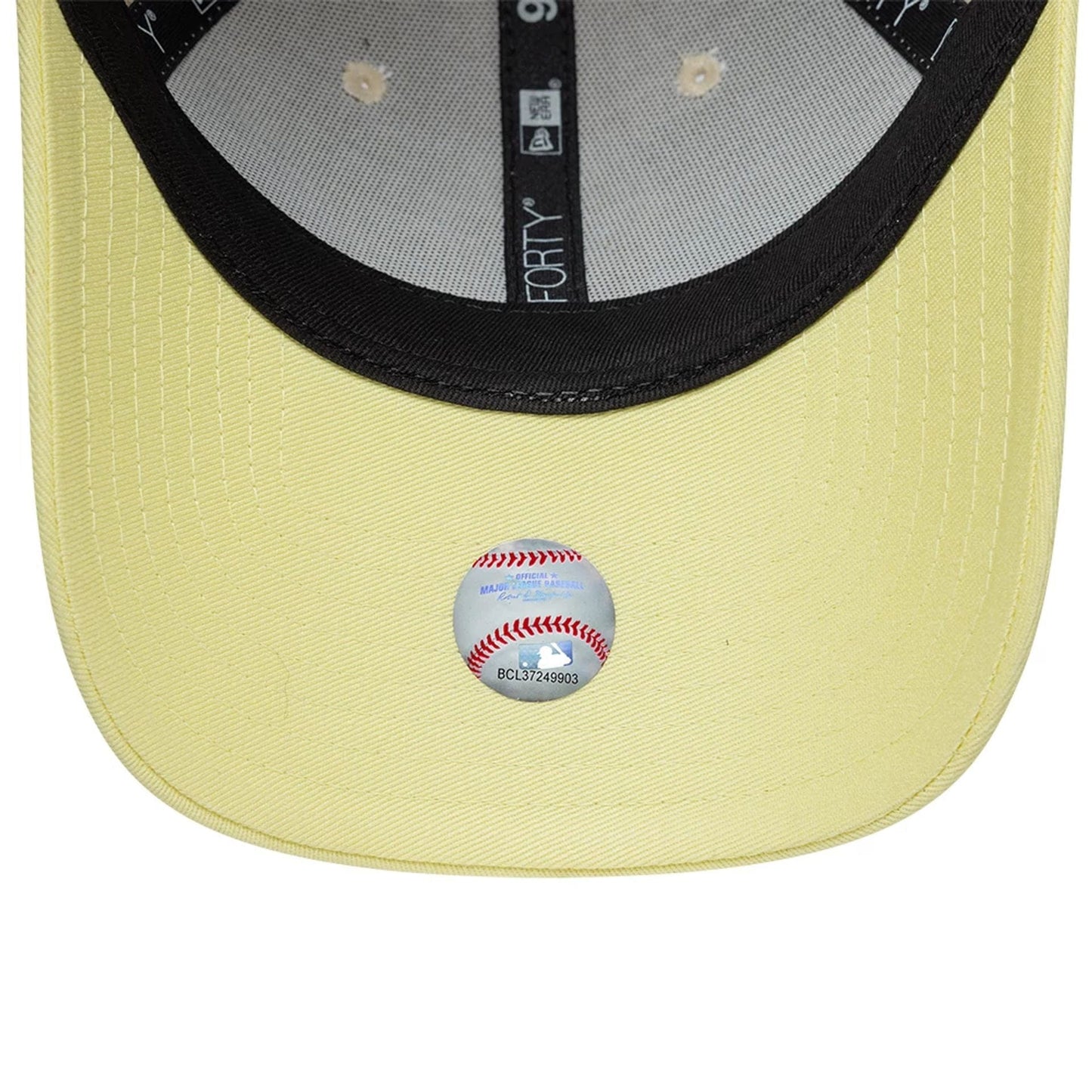 New York Yankees Womens MLB Floral Cream & Yellow New Era 9FORTY Adjustable Cap, inside view showing the black taping with white text, the yellow undervisor with a baseball-themed sticker, and the interior eyelets on the structured crown.