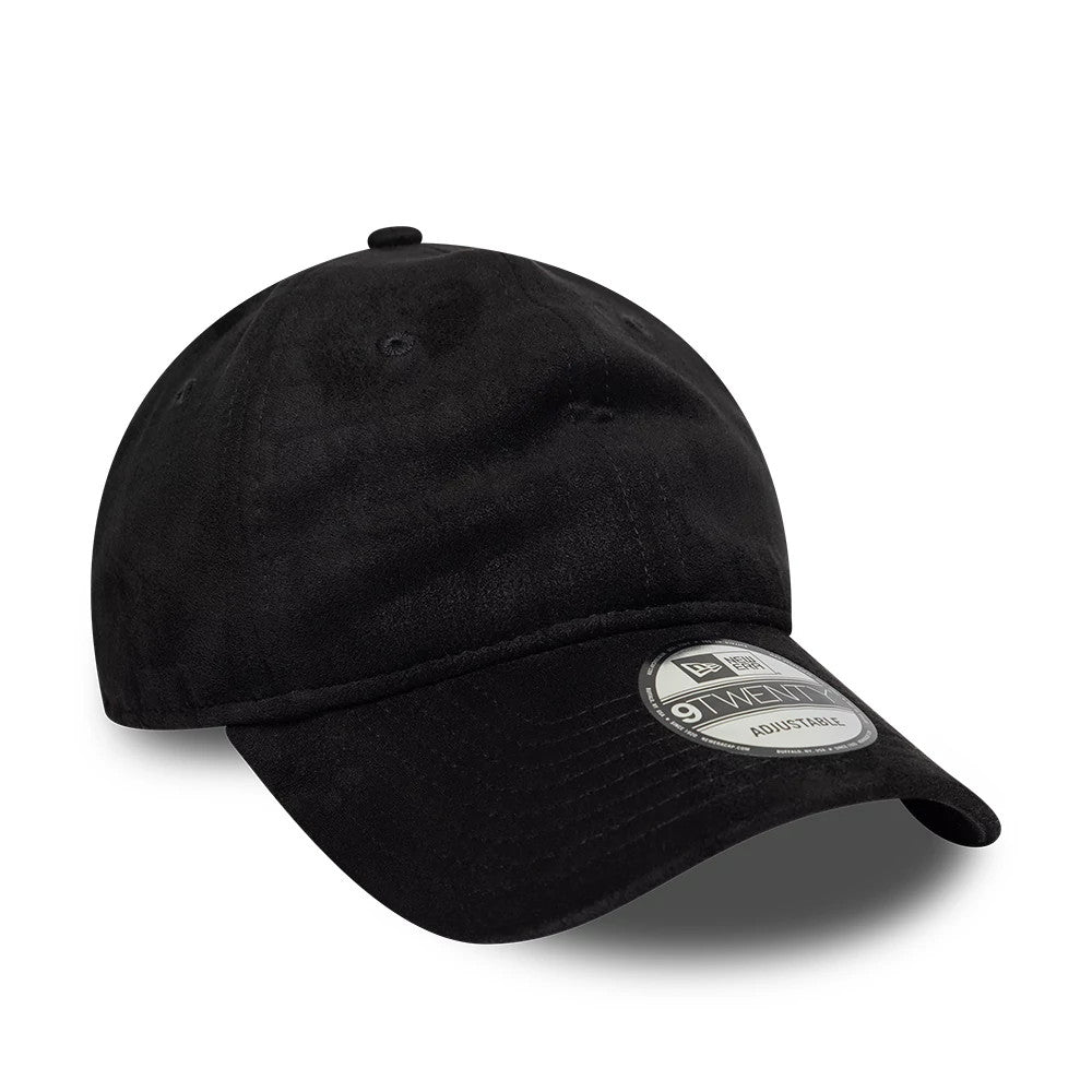 New Era Textured Black 9TWENTY Adjustable Cap, three-quarter view showing a curved black visor with stitching, a textured black crown with embroidered eyelets, and a prominent 9TWENTY size sticker on the top of the visor.