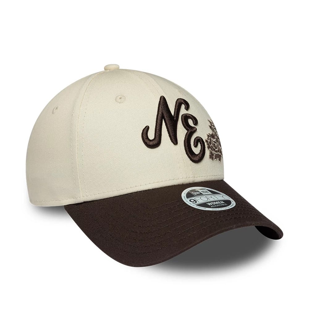 Womens New Era Floral Light Beige 9FORTY Adjustable Cap, three-quarter view showing a brown embroidered NE logo on the front panel, floral detail to the side, with a contrasting dark brown curved visor and a 9FORTY size sticker.