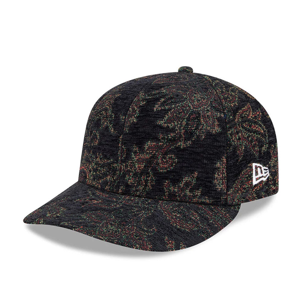 New Era Jacquard Chenille Black 59FIFTY Fitted Cap, three-quarter view showing an intricate black and multicolour jacquard chenille pattern across the crown and visor, with the white embroidered New Era flag logo on the left side.