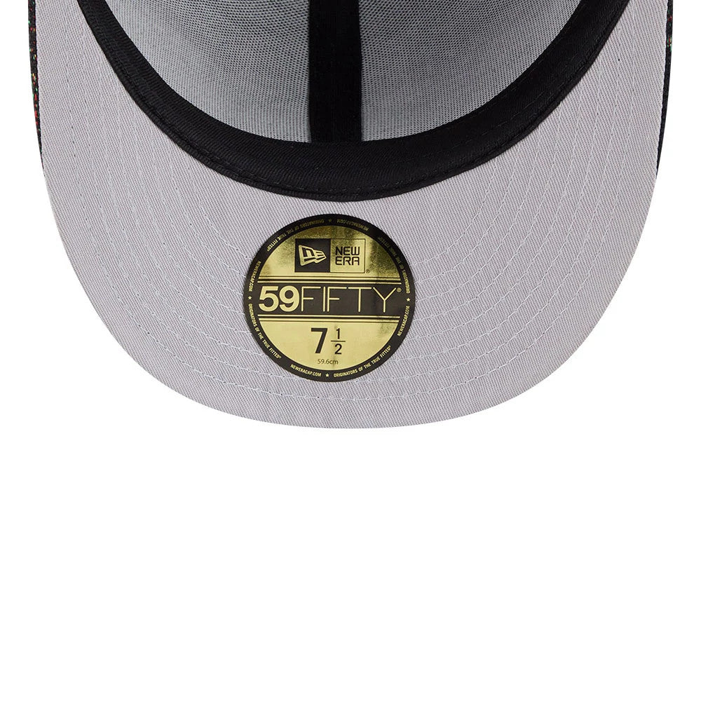 New York Knicks NBA Jacquard Chenille Black New Era 59FIFTY Fitted Cap, inside view showing a grey undervisor with a gold 59FIFTY size sticker, detailed black sweatband encircling the crown.