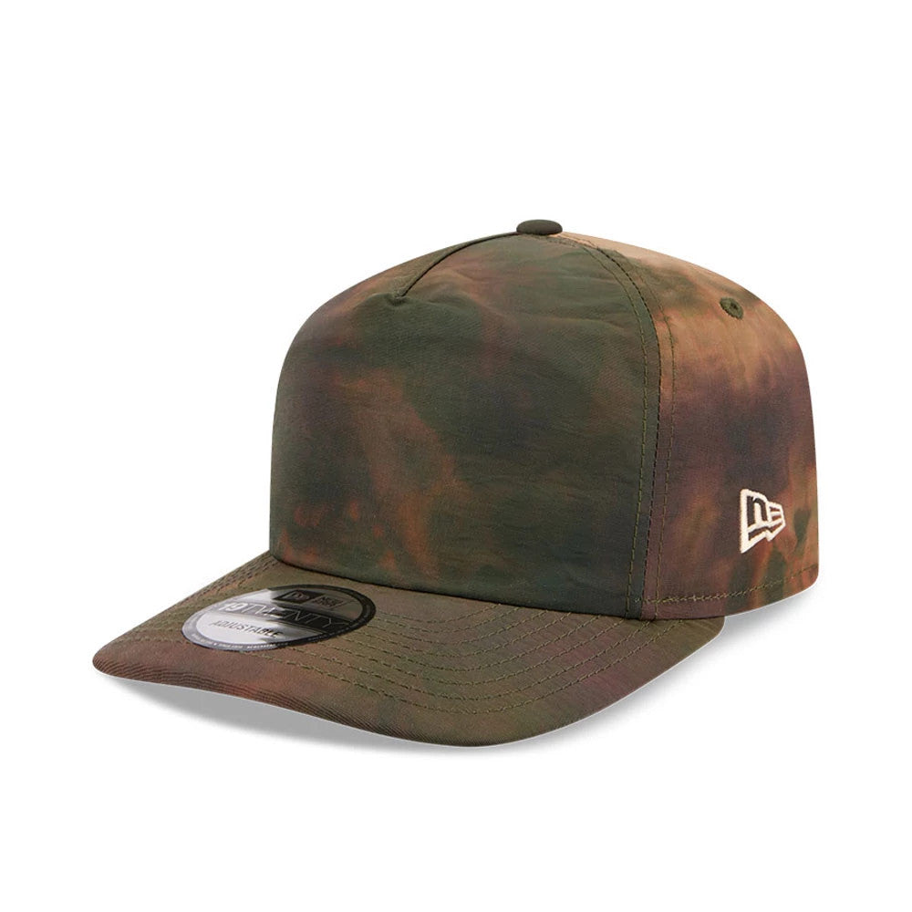 New Era Nylon Wash Dye Open Green 19TWENTY Adjustable Cap, three-quarter view showing the embroidered New Era flag logo on the left side, a structured crown with a green and brown wash dye pattern, and a 19TWENTY size sticker on the visor.