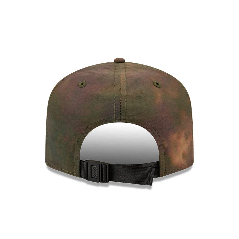 New York Mets MLB Nylon Wash Dye Open Green New Era 19TWENTY Adjustable Cap, rear view showing the nylon fabric with a camouflage-style dye pattern, a black strap with a buckle closure, and matching green embroidered eyelets on the panels.
