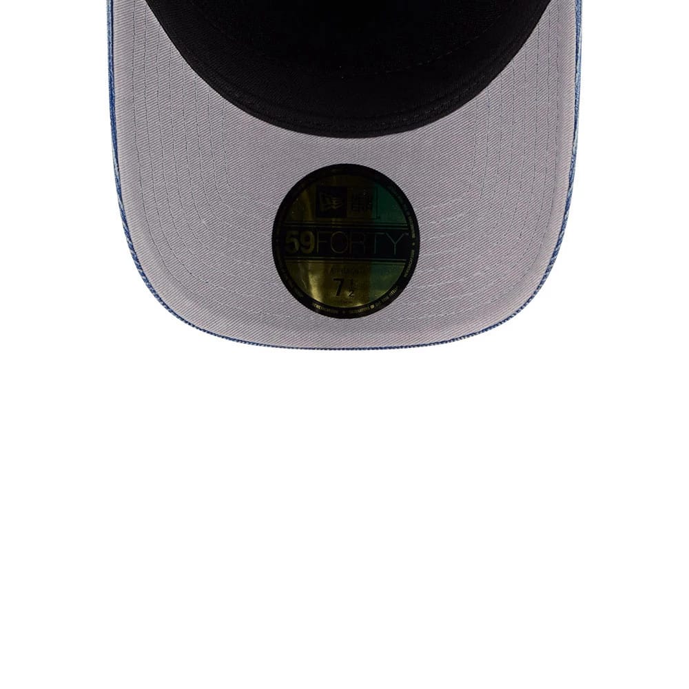Mets MLB Snow Wash Cord Blue New Era 59FORTY A-Frame Fitted Cap, inside view showing a light grey undervisor with a 59FORTY size sticker and contrast stitching along the edge, providing a detailed look at the under-visor design.