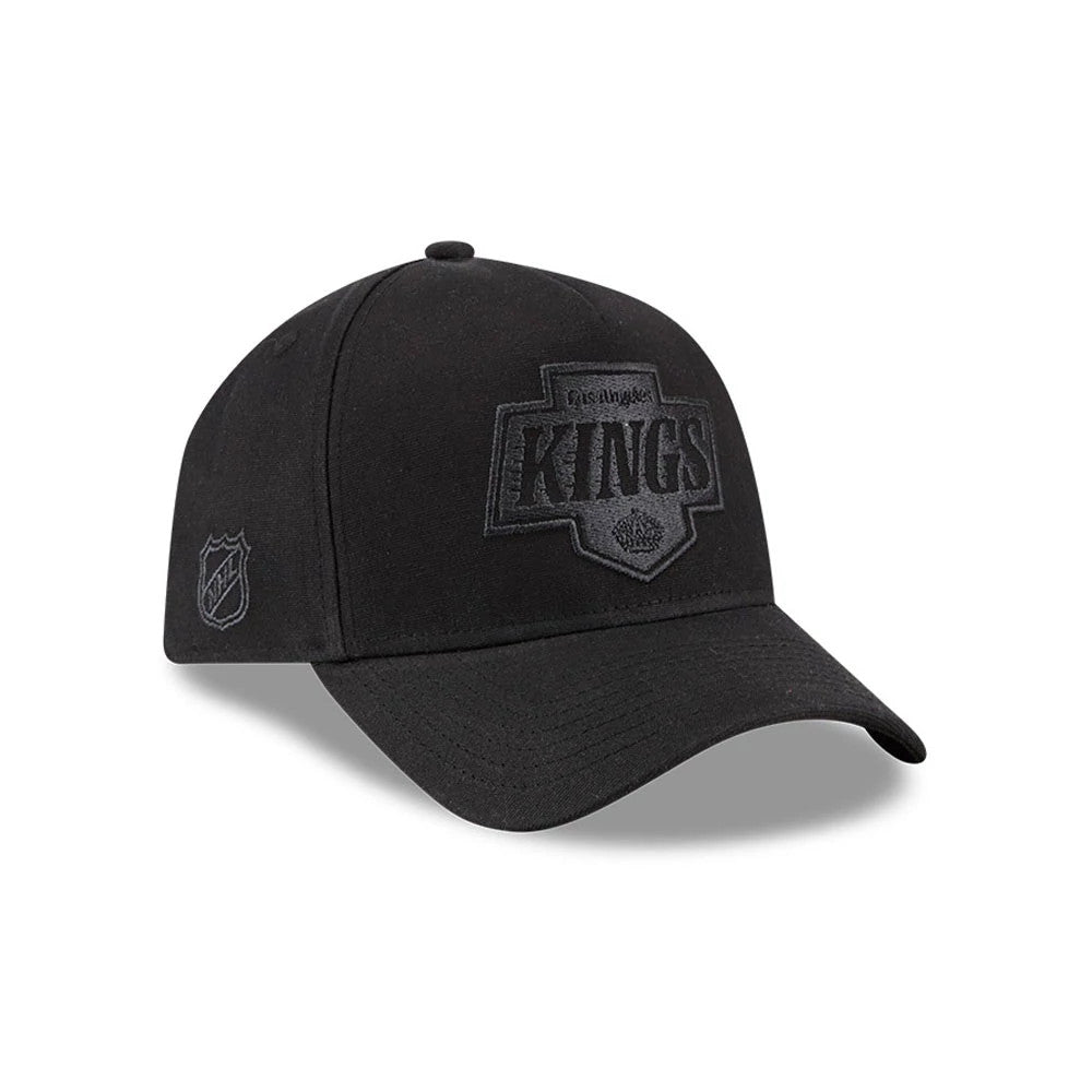 Kings NHL Waxy Canvas Black New Era 59FORTY A-Frame Fitted Cap, front view showing the monochrome black Kings logo in raised embroidery on the front panel, with a curved black visor and an NHL shield logo on the left side.