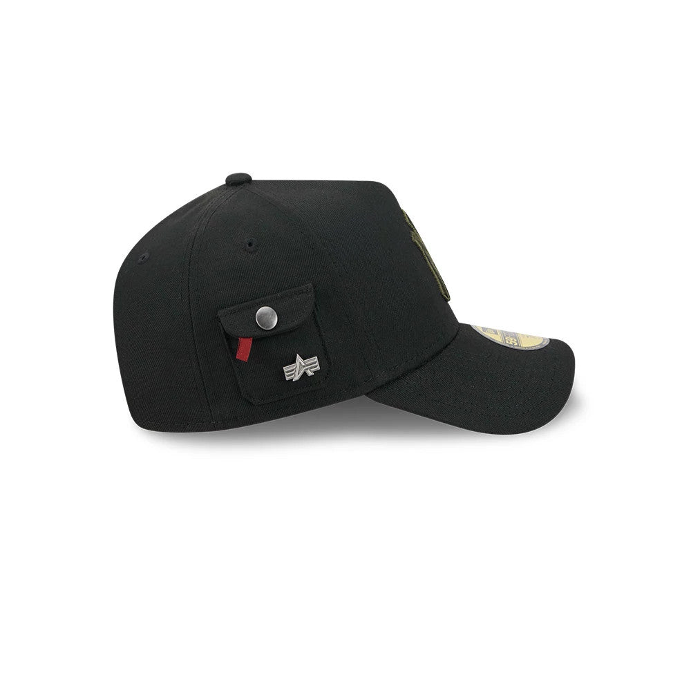 New York Yankees MLB X Alpha Black New Era 59FORTY A-Frame Fitted Cap, side view featuring a unique side pocket with a silver button, the silver A logo below, and a slightly curved black visor with a gold 59FORTY size sticker on top.