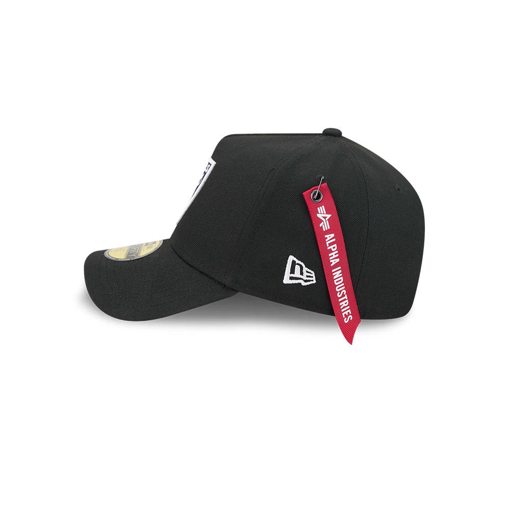 Las Vegas Raiders NFL X Alpha Black New Era 59FORTY A-Frame Fitted Cap, side view showing the embroidered New Era flag logo in white on the left side, a red Alpha Industries tag attached to the top button and a flat black visor with a size sticker.