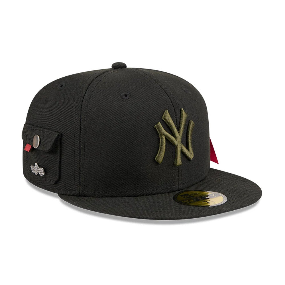 New York Yankees MLB X Alpha Black New Era 59FIFTY Fitted Cap, three-quarter view showing the olive NY logo in raised embroidery on the front panel, with a structured black crown and a 59FIFTY size sticker on the flat visor.