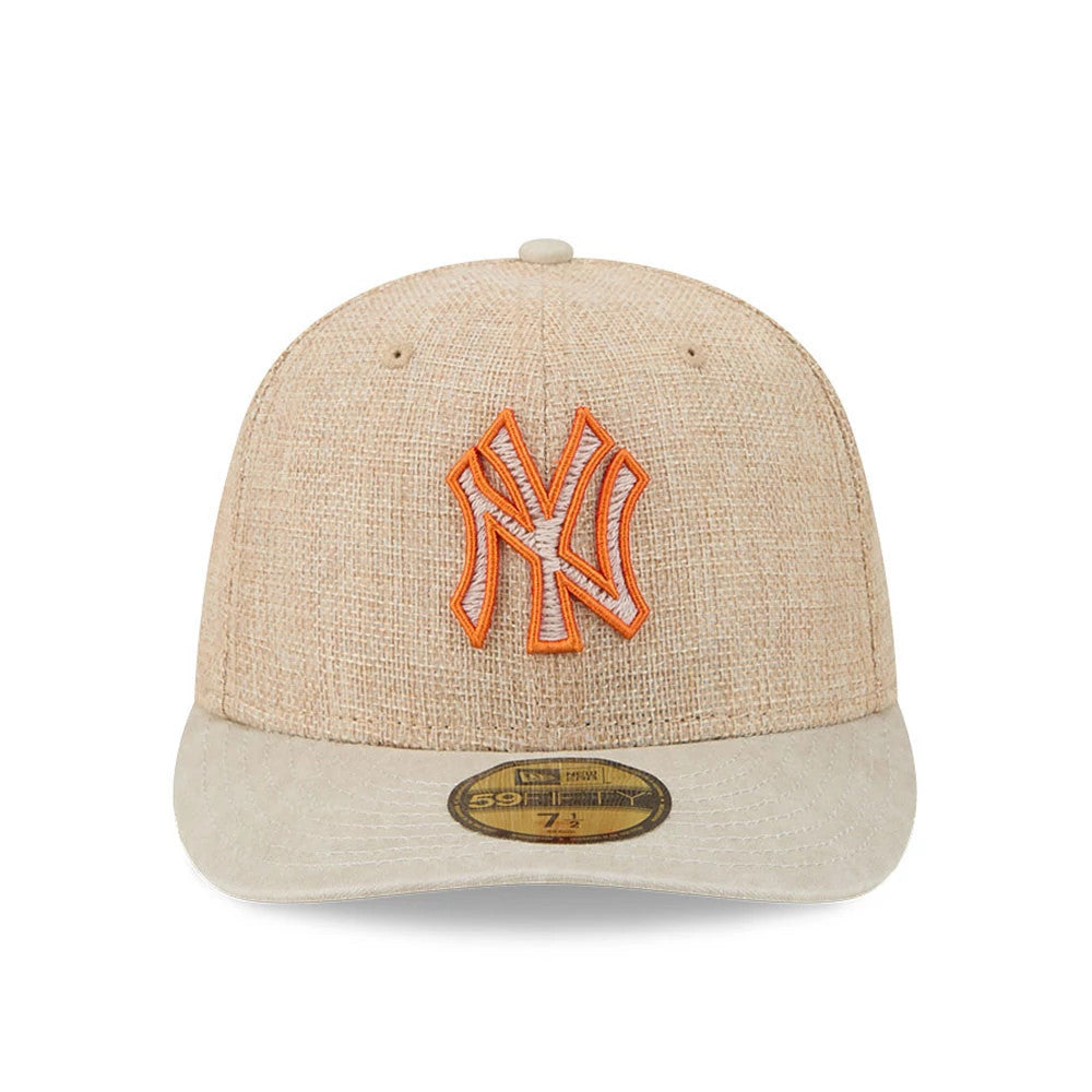 New York Yankees MLB Halloween Beige New Era 59FIFTY Fitted Cap, front view showing the raised orange embroidered NY logo on the textured beige front panels, with a beige flat visor and a gold 59FIFTY size sticker on the visor.