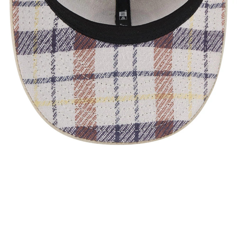 Philadelphia Phillies MLB Halloween Beige New Era 59FIFTY Fitted Cap, inside view showing a black sweatband, a plaid undervisor pattern in beige, orange, blue and yellow, and a black seam tape with a New Era flag logo label.