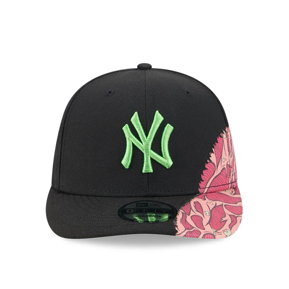 New York Yankees MLB Halloween Black New Era 9FIFTY Snapback Adjustable Cap, front view showing a neon green raised embroidered NY logo on the structured black crown, with pink graphic artwork on the right visor.