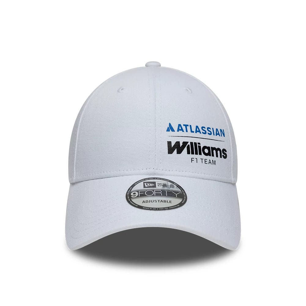 Williams Essential White New Era 9FORTY Adjustable Cap, front view showing the blue and black embroidered Atlassian and Williams F1 Team logos on the white front panel, with a curved white visor featuring a 9FORTY size sticker at the centre.