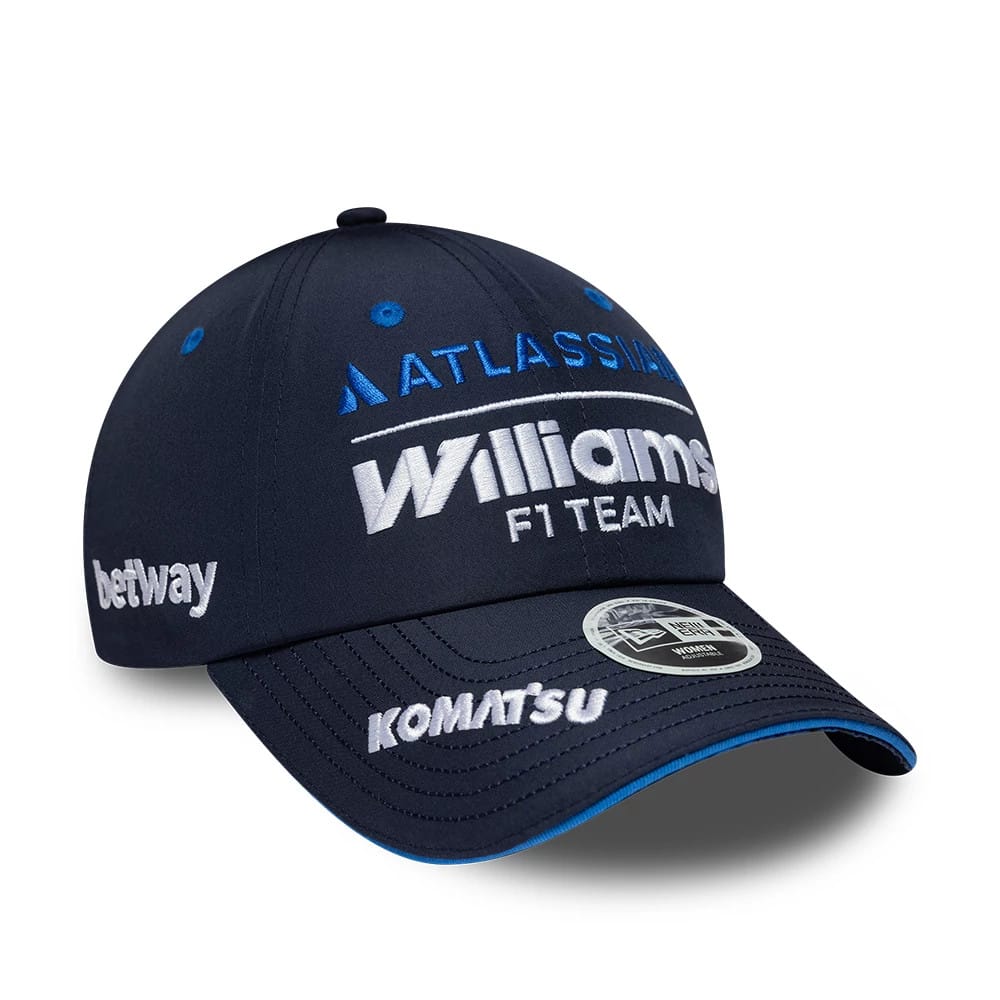 New Era Womens Williams Team Navy Open Back Cap, front view showing embroidered Williams F1 Team logo in white and Atlassian logo in blue on the structured navy crown, with a 9FORTY size sticker and Komatsu text on the navy curved visor.