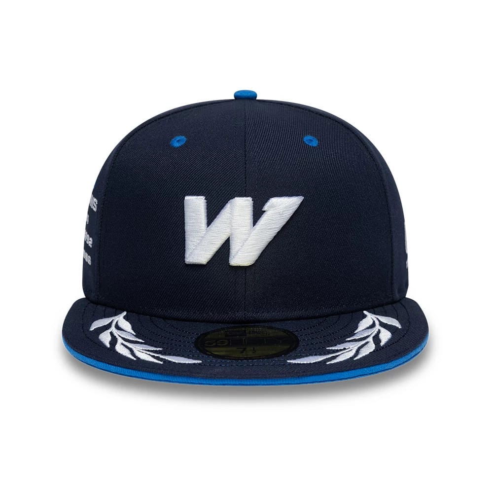 Williams Launch Navy New Era 59FIFTY Fitted Cap, front view showing the white embroidered W logo on the structured navy crown, with white laurel embroidery on the visor and a gold 59FIFTY size sticker on the dark visor.