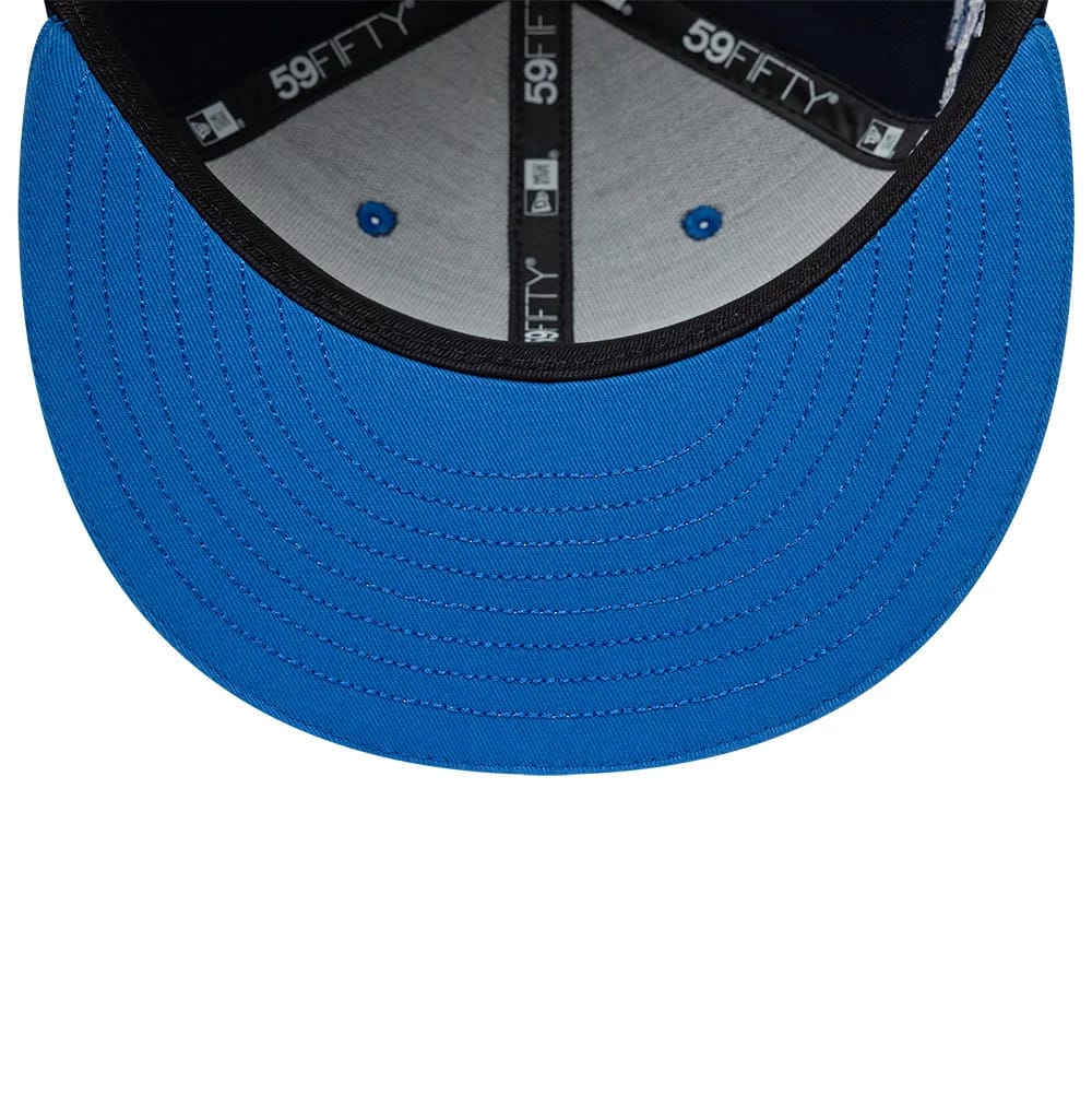 Williams Launch Navy New Era 59FIFTY Fitted Cap, inside view showing the blue undervisor, black sweatband with white 59FIFTY branding, and grey interior panel with matching blue eyelets.