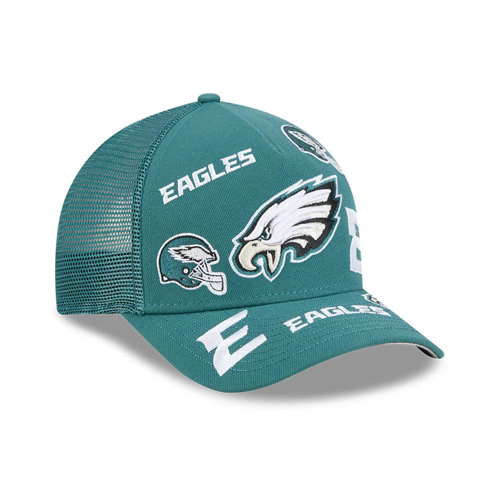 Eagles NFL All Over Dark Green New Era 9FORTY M-Crown A-Frame Trucker Adjustable Cap, three-quarter view showing front panel embroidered logo of the Eagles and multiple white embroidered graphics across the dark green structured crown.
