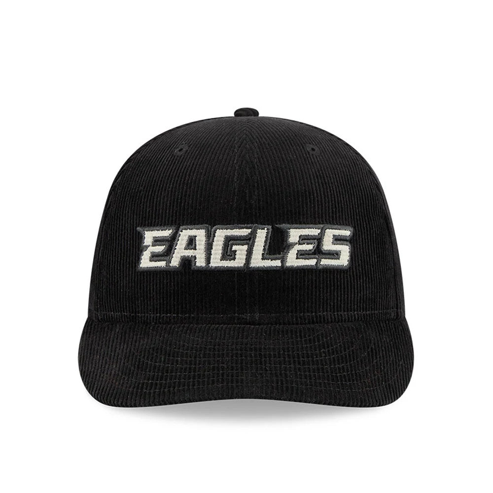 Eagles NFL 2 Tone Cord Black New Era 9FIFTY Snapback Adjustable Cap, front view showing raised white embroidered Eagles lettering on a black corduroy crown with a curved visor, featuring a top button and embroidered eyelets.