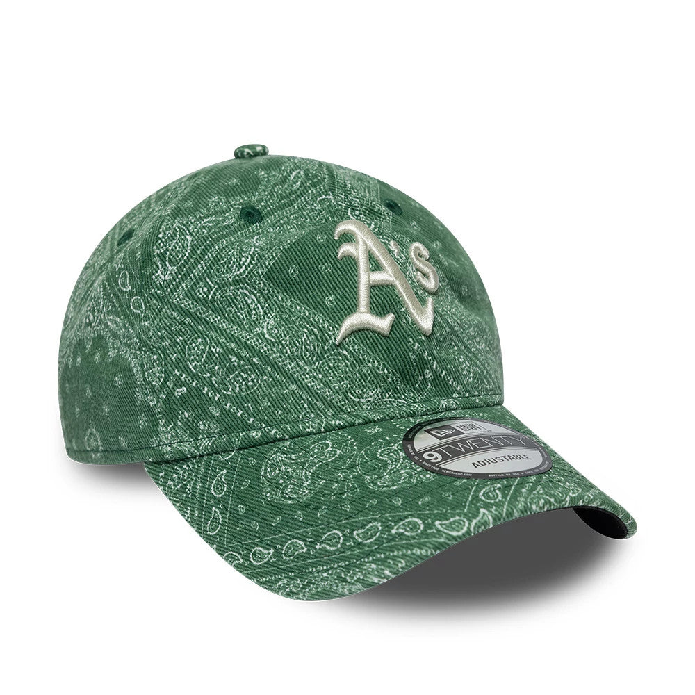 Athletics MLB Washed Paisley Dark Green New Era 9TWENTY Adjustable Cap, three-quarter view showing the raised embroidered A’s logo on the front panel, paisley print across the structured crown and a 9TWENTY size sticker on the slightly curved visor.