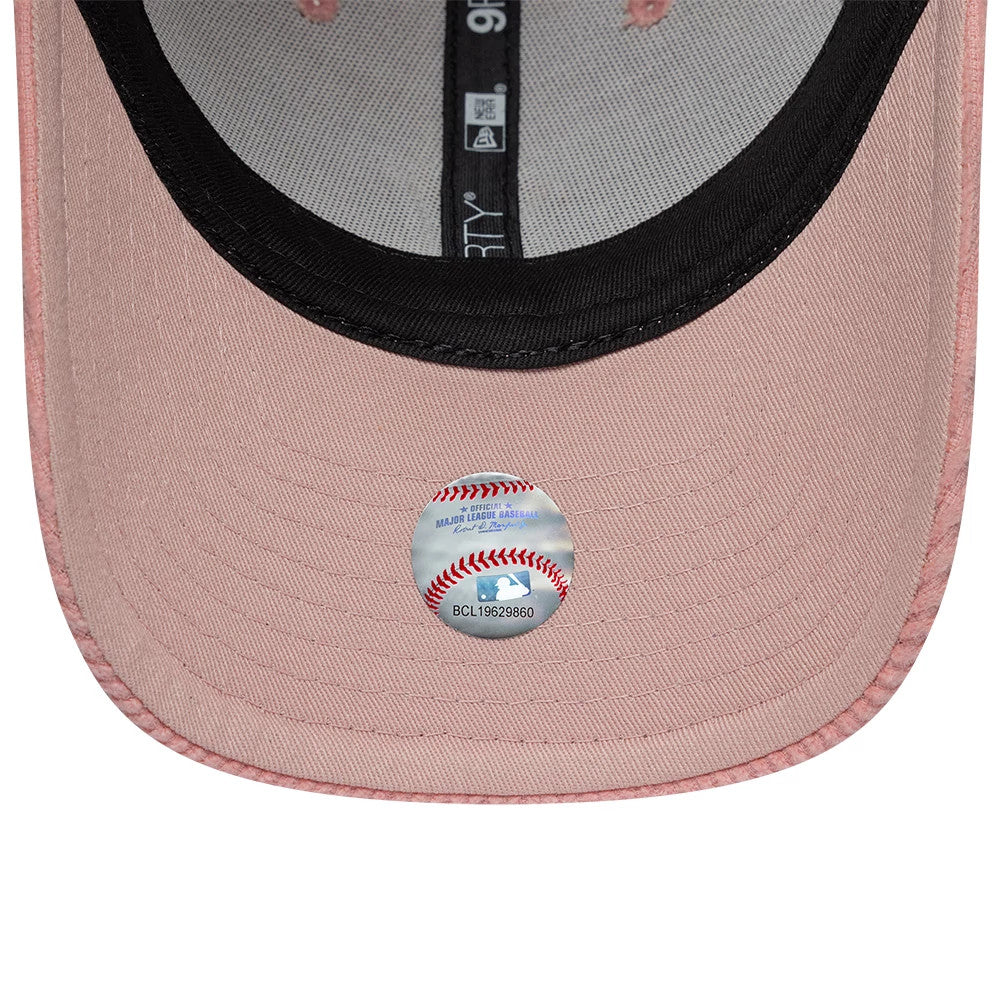 New York Yankees Womens MLB Pastel Cord Pink New Era 9FORTY M-Crown Adjustable Cap, inside view showing a black sweatband, grey taping with white New Era branding, and a round authenticity sticker on the pink undervisor.