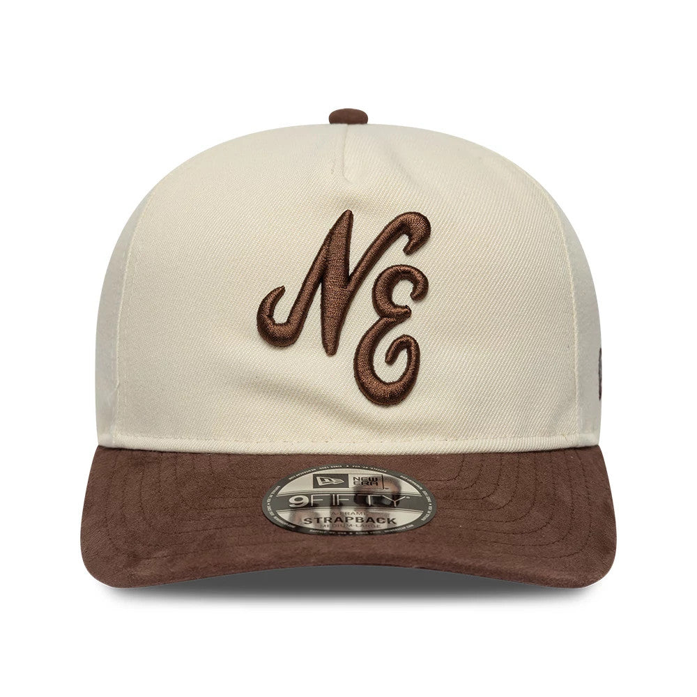 New Era Suede Visor Cream New Era 9FIFTY A-Frame Adjustable Cap, front view showing the brown embroidered NE logo on the cream front panel, a brown suede visor, and a 9FIFTY size sticker placed centrally on the visor.