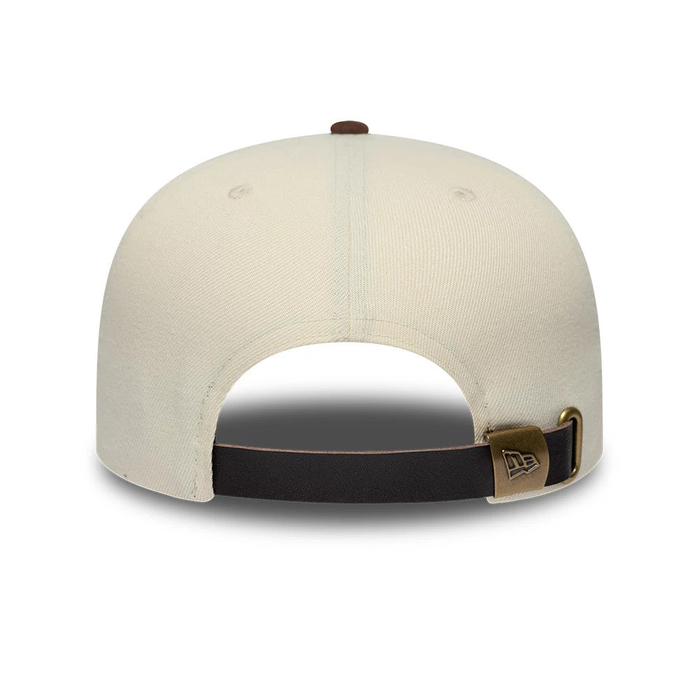 Chicago White Sox MLB Suede Visor Cream New Era 9FIFTY A-Frame Adjustable Cap, rear view showing the antique brass clasp on a brown leather strap at the back, a brown top button, and a cream crown with embroidered eyelets.