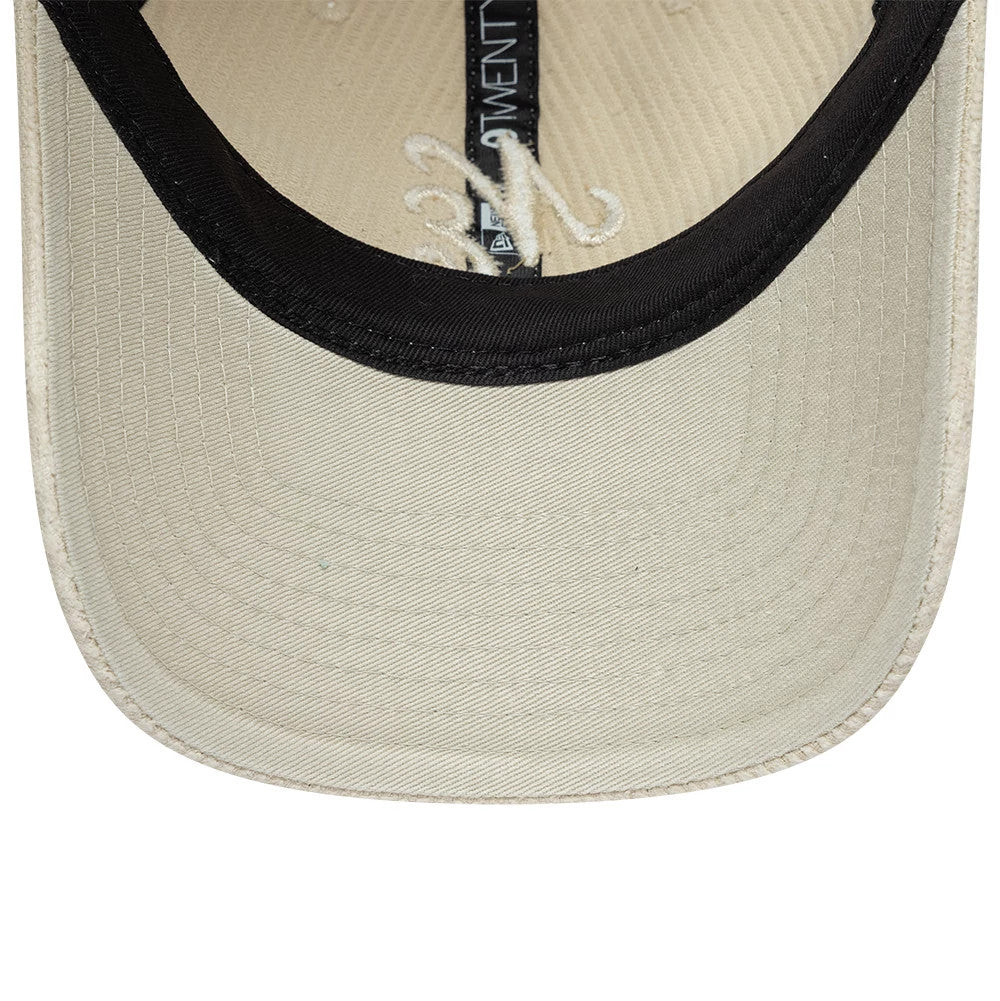 Pictured is this New Era Washed Cord 9TWENTY cap in Cream. 7