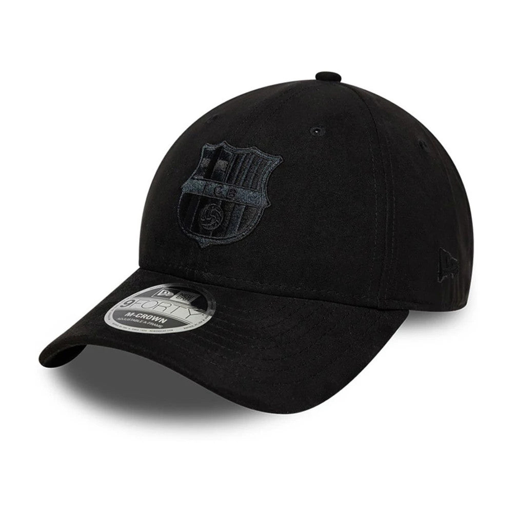 FC Barcelona Faux Suede Black New Era 9FORTY M-Crown Adjustable Cap, three-quarter view showing the black embroidered FC Barcelona crest on the front panel, the black curved visor with a 9FORTY size sticker.