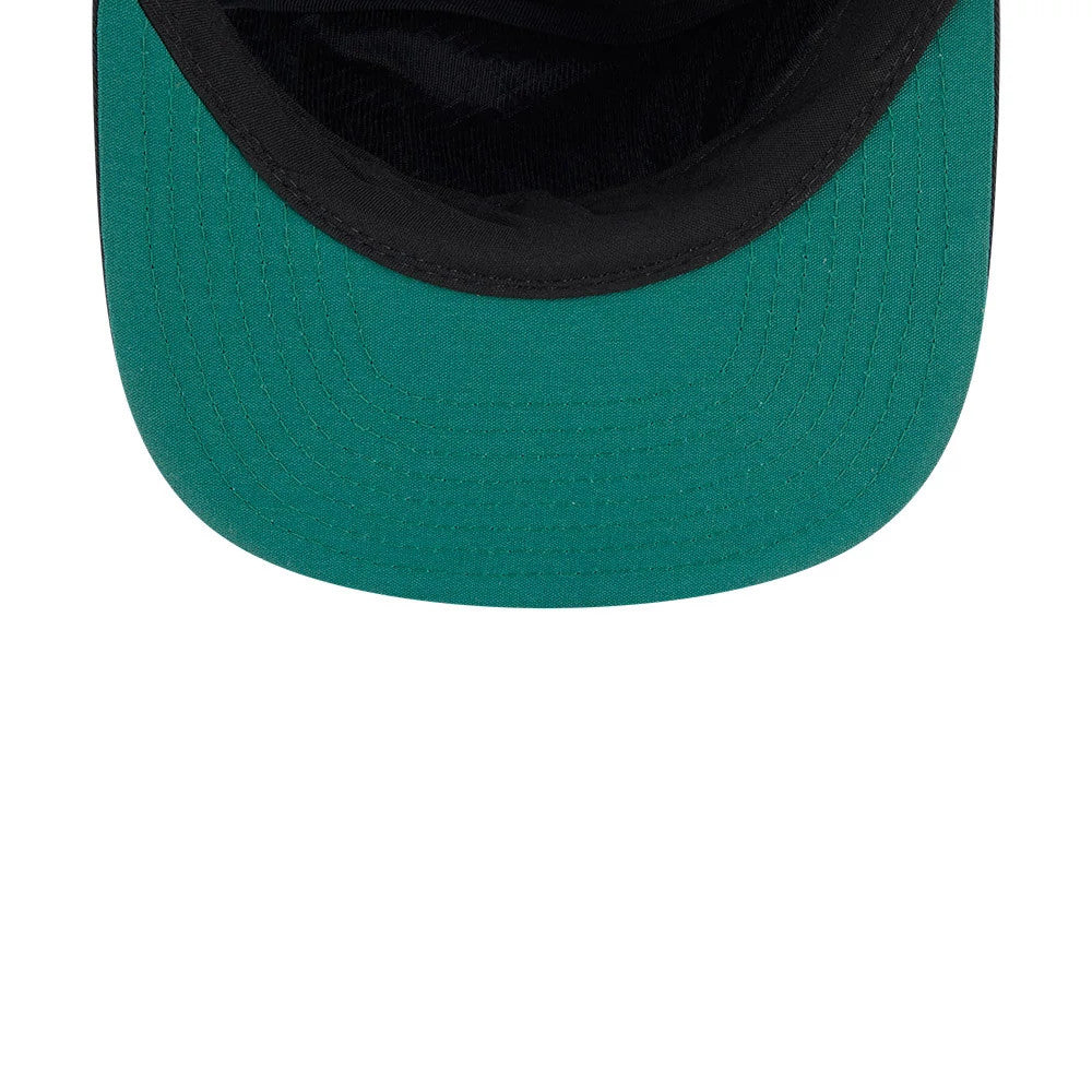 New Era Recycled Twill Black 19TWENTY Adjustable Cap, inside view showing the contrasting green undervisor and the black sweatband with inner stitching, highlighting the cap’s eco-friendly recycled twill material.