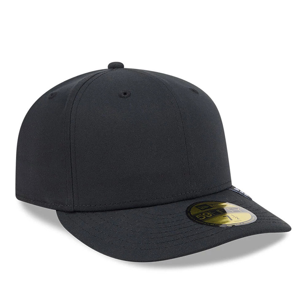 New Era Recycled Twill Black 59FIFTY Fitted Cap, three-quarter view showing a plain black structured crown front with matching visor, detailed with a gold 59FIFTY size sticker on the visor's top and the New Era flag logo on the left side.