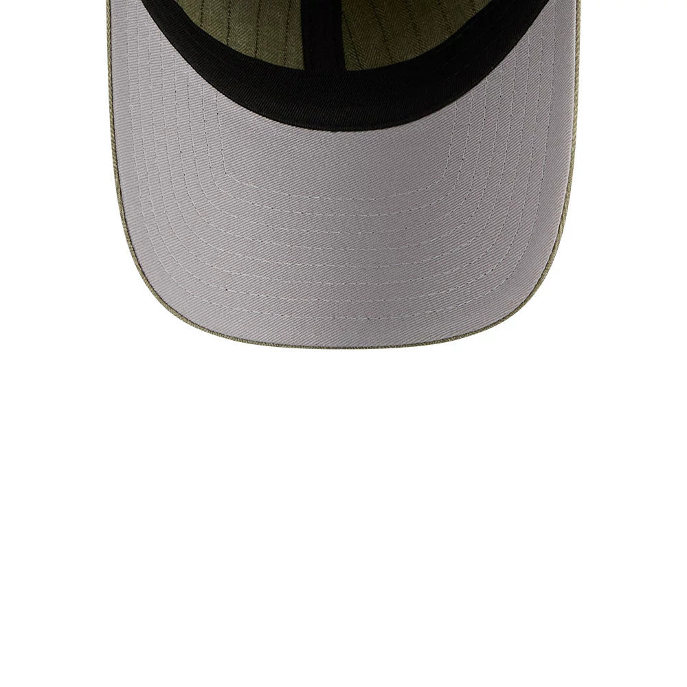 New Era Herringbone Pinstripe Green Casual Classic Adjustable Cap, inside view showing the grey undervisor with detailed stitching, black sweatband lining the cap's edge, and herringbone pattern on the interior panels.