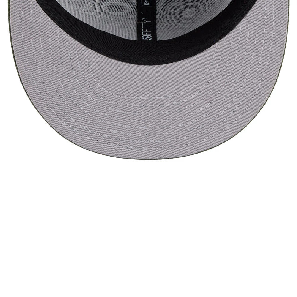 Top Gun Green New Era 59FIFTY Fitted Cap, inside view showing the black sweatband with a 59FIFTY label, grey undervisor with detailed stitching, and a glimpse of the interior taping that circles the structured crown.