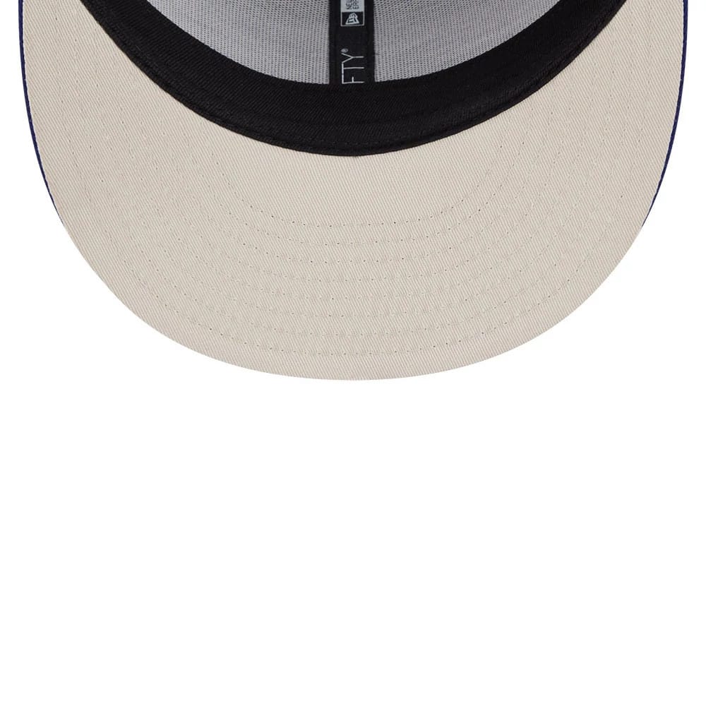 Pictured is this Top Gun 9FIFTY Trucker cap in dark blue. 2