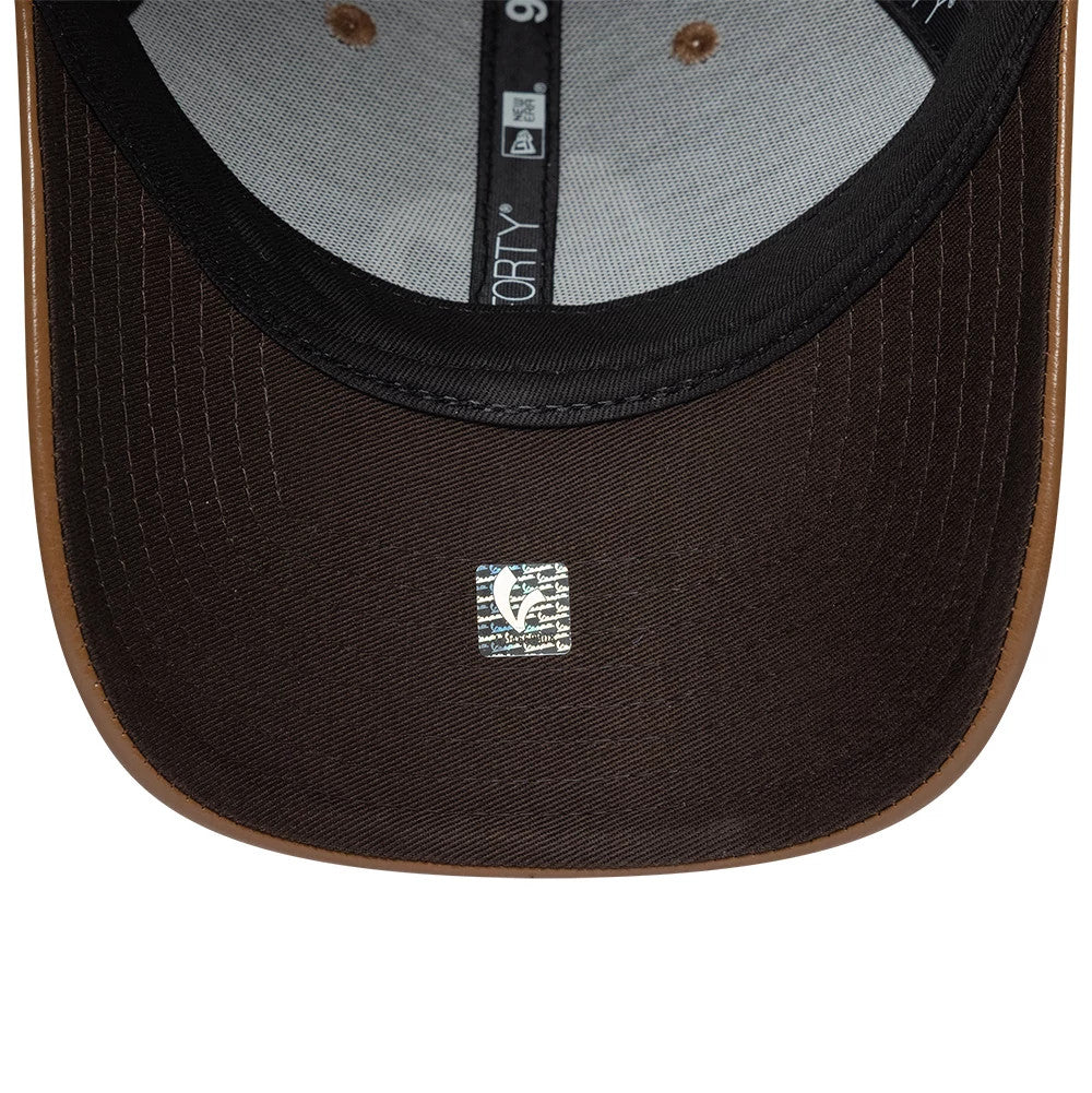 Pictured is this Crinkle PU Vespa 9FORTY Adjustable cap in dark brown. 7
