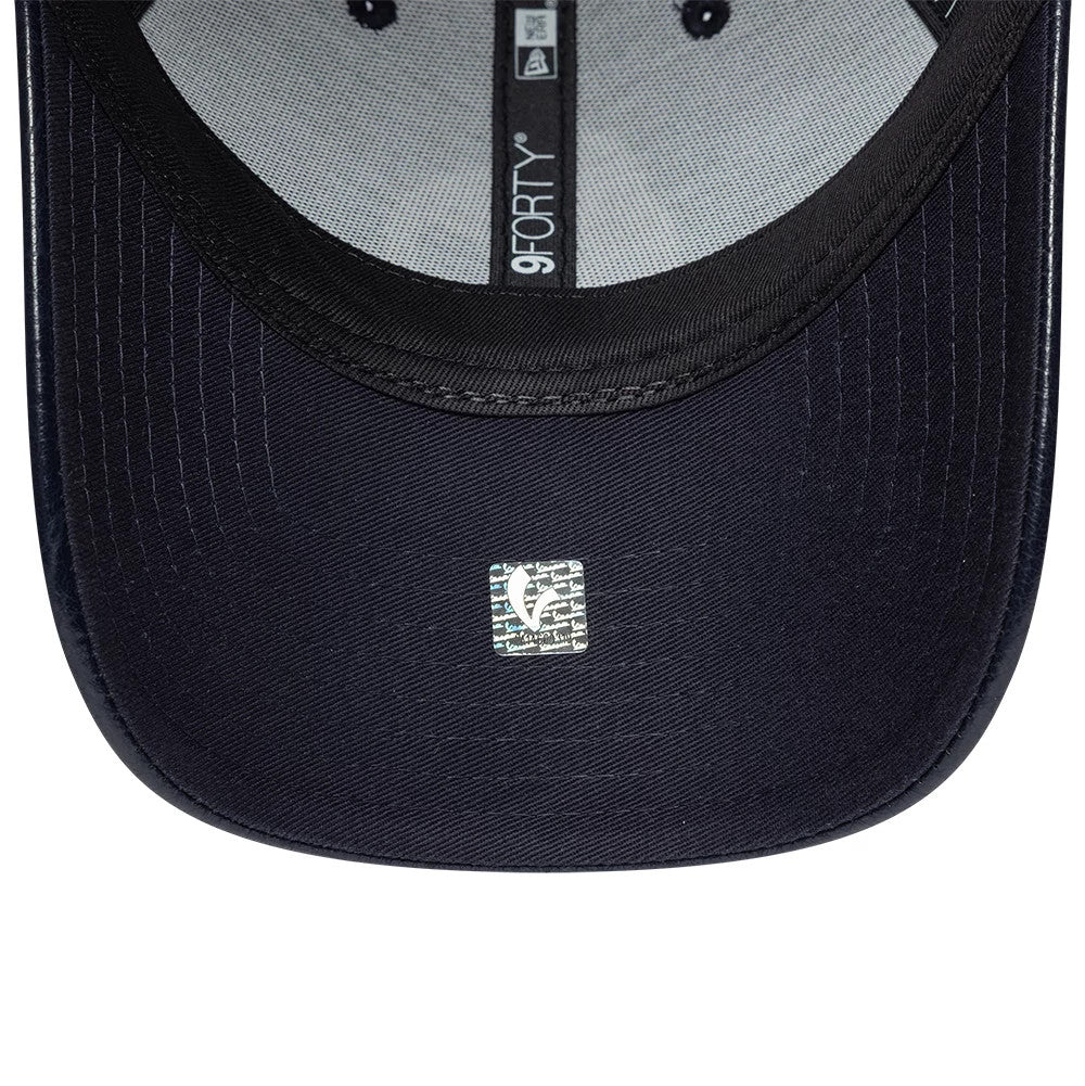 Pictured is this Crinkle PU Vespa 9FORTY Adjustable cap in navy. 7