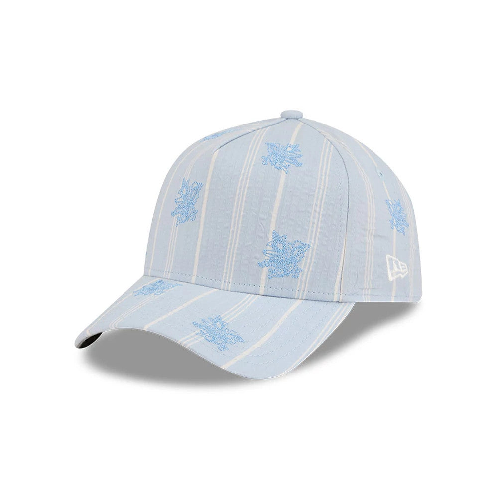 New Era Seersucker Pastel Blue 59FORTY A-Frame Fitted Cap, three-quarter view showing the white embroidered New Era flag logo on the left side, a structured crown with blue floral patterns, and a curved visor.