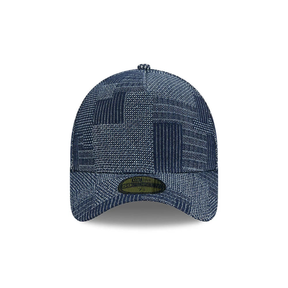 New Era Patchwork Denim Navy New Era 59FORTY A-Frame Fitted Cap, front view showing the unique denim patchwork pattern on the structured crown, a matching curved visor, and the 59FORTY size sticker centrally located on the visor.