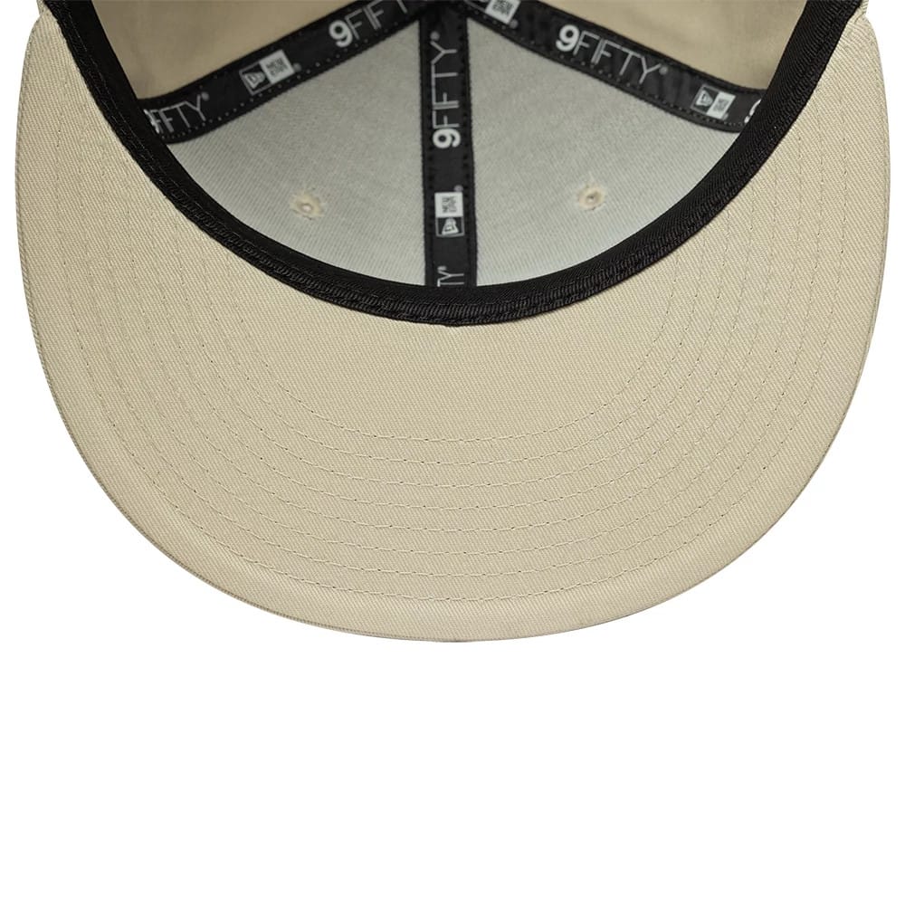 Pictured is this MLB League Essential New York Yankees 9FIFTY Snapback Adjustable cap in light beige. 5