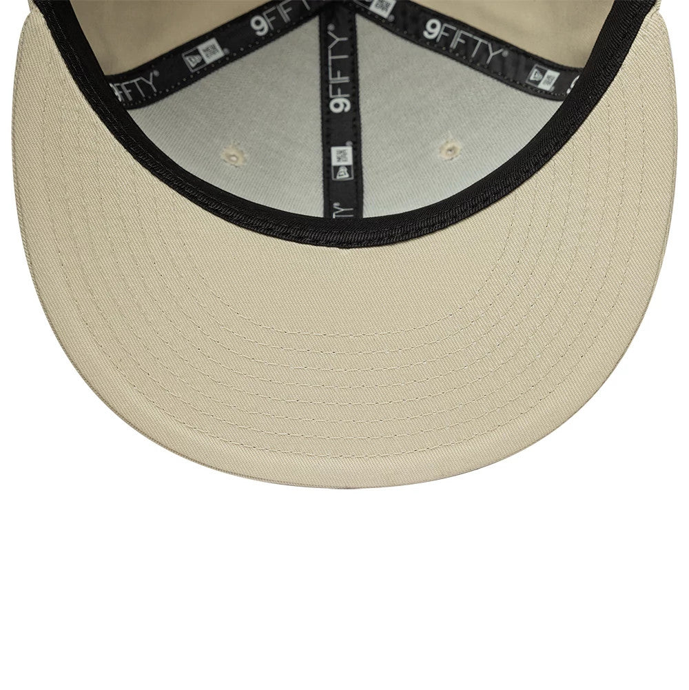 Pictured is this MLB League Essential New York Yankees 9FIFTY Snapback Adjustable cap in light beige. 5