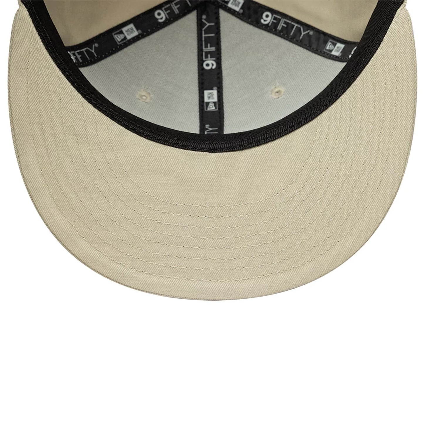 Pictured is this MLB League Essential New York Yankees 9FIFTY Snapback Adjustable cap in light beige. 5