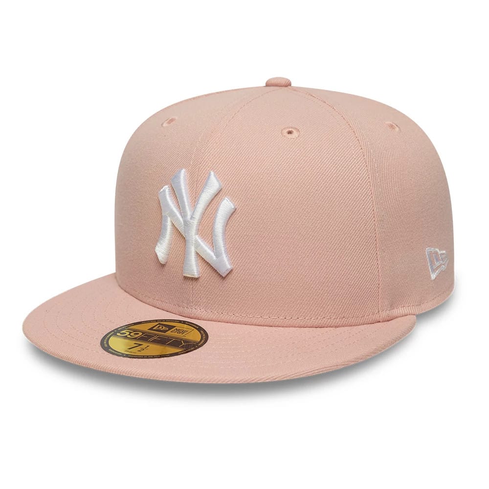Pictured is this MLB League Essential New York Yankees 59FIFTY Fitted cap in pastel pink. 1