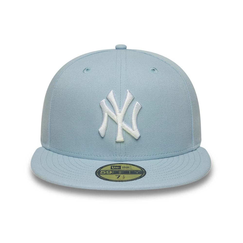 Pictured is this MLB League Essential New York Yankees 59FIFTY Fitted cap in pastel blue. 2