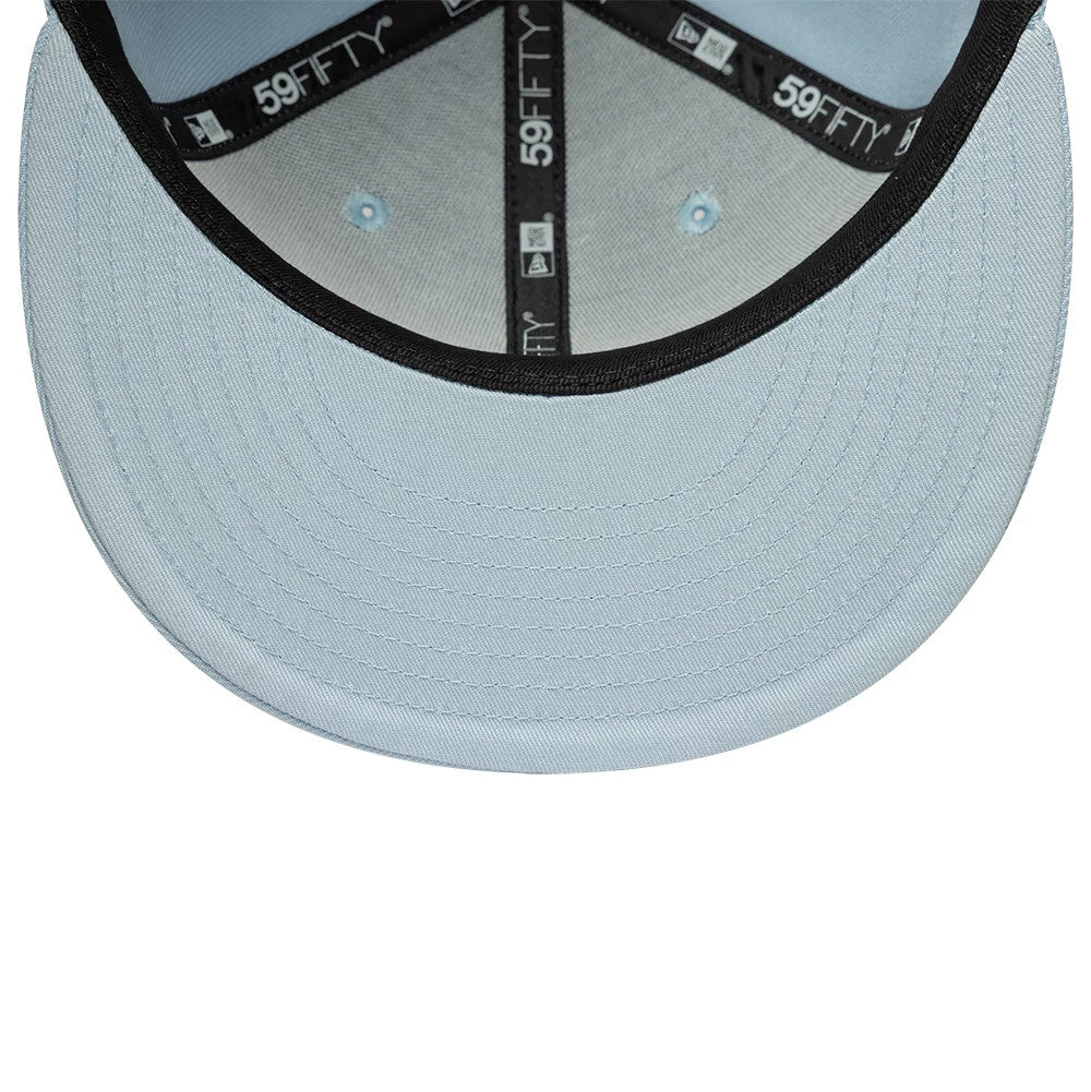 Pictured is this MLB League Essential New York Yankees 59FIFTY Fitted cap in pastel blue. 5