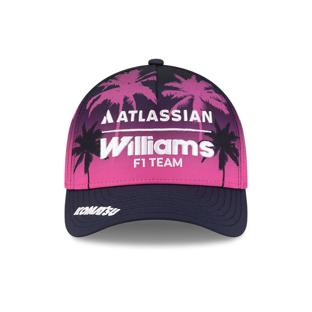 Williams Miami Navy New Era 9FORTY M-Crown A-Frame Adjustable Cap, front view showing raised white embroidered Williams F1 Team logo with pink palm tree pattern, and a navy curved visor with Komatsu lettering on the right side.