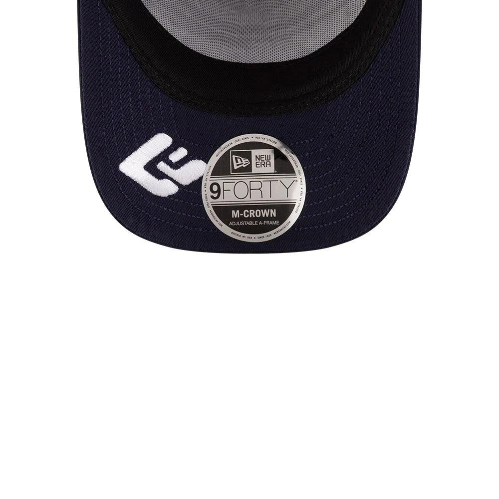 Williams Alex Albon Miami Navy New Era 9FORTY M-Crown A-Frame Adjustable Cap, close-up showing the navy curved visor with a 9FORTY size sticker and a white logo embroidered on the right side of the visor.
