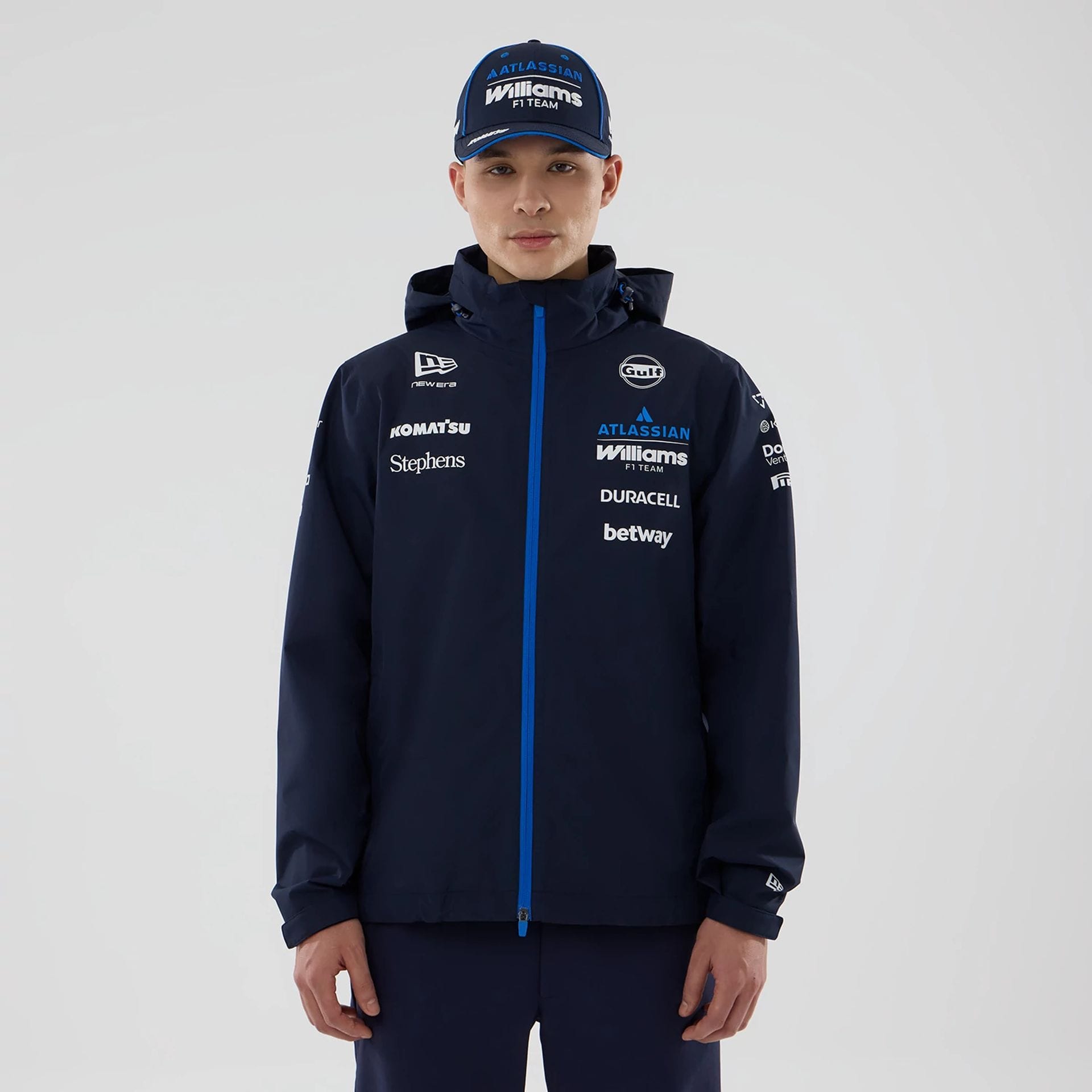 The model is wearing this Atlassian Williams F1 Team Rain Jacket in navy. 1