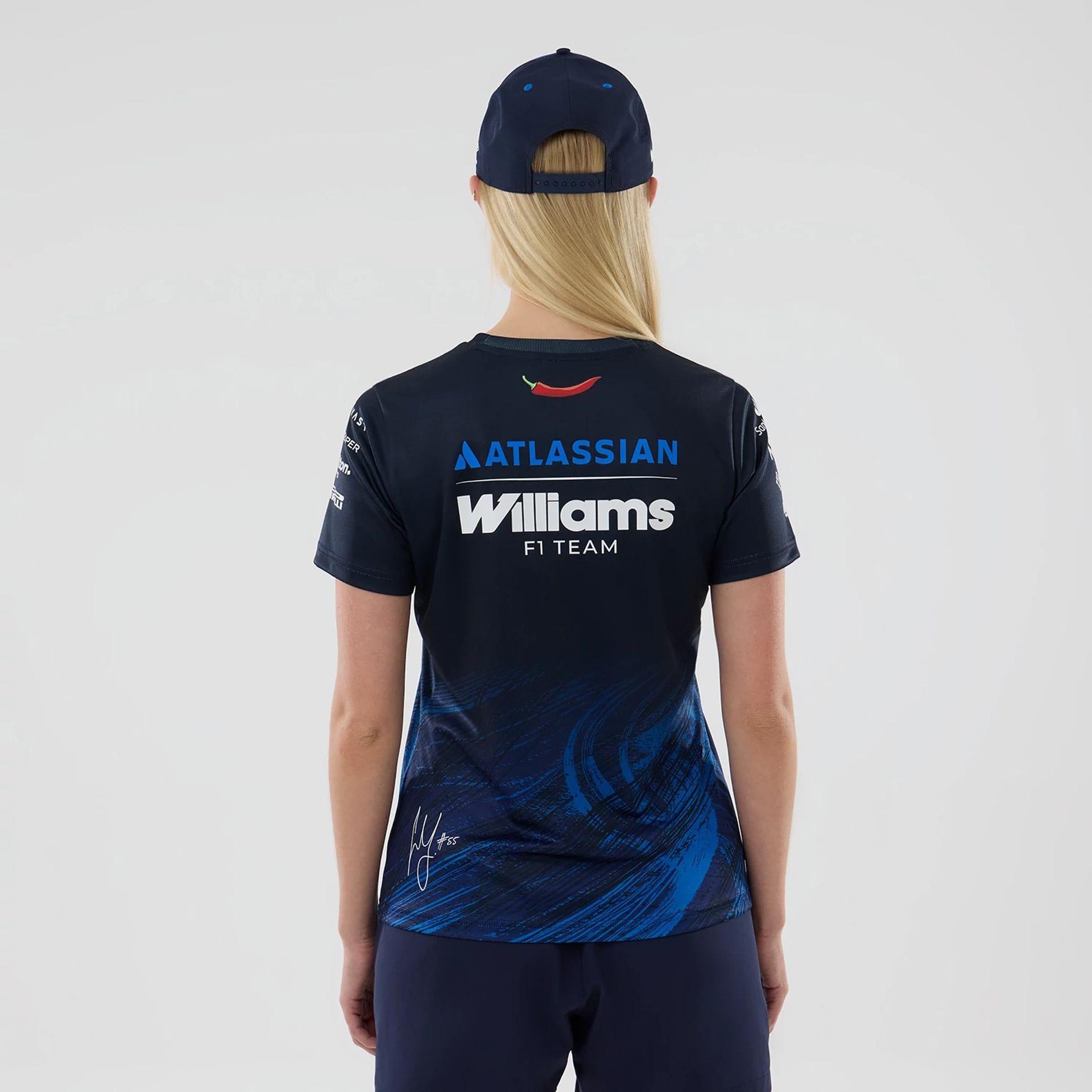 The model is wearing this Womens Carlos Sainz Atlassian Williams F1 Team Tech T-shirt in navy. 2