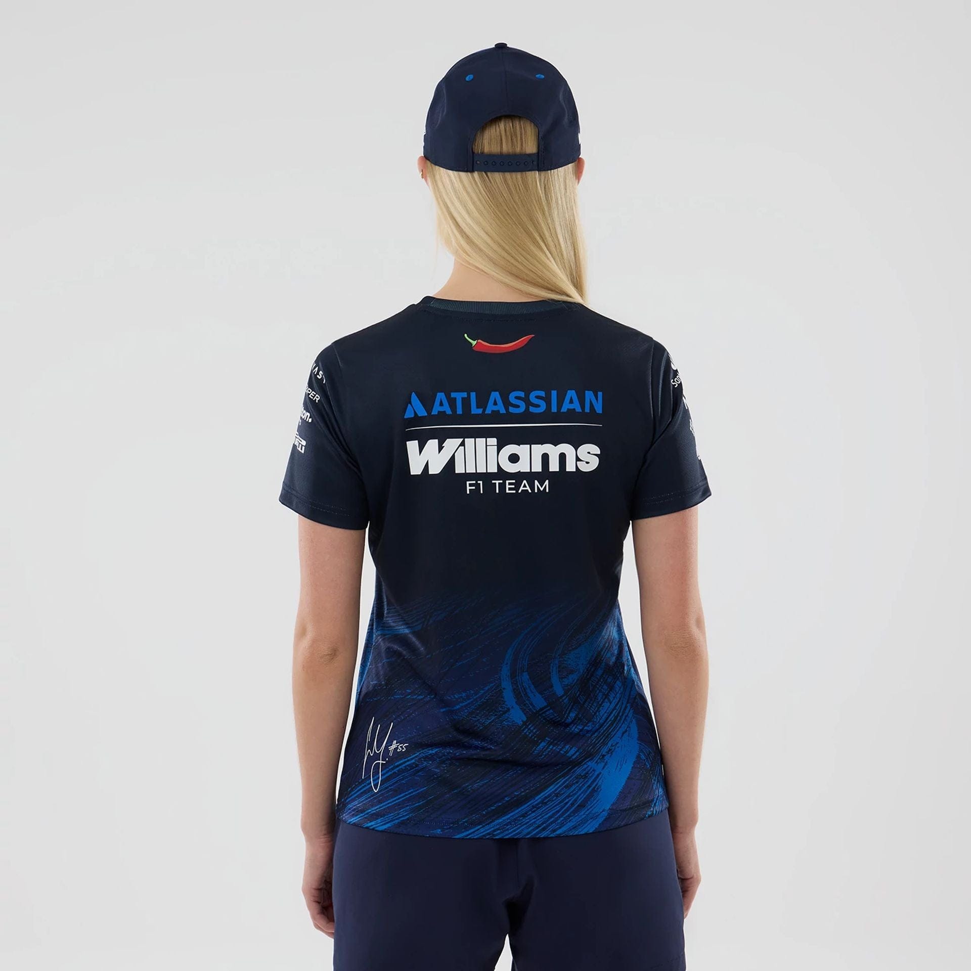 The model is wearing this Womens Carlos Sainz Atlassian Williams F1 Team Tech T-shirt in navy. 2