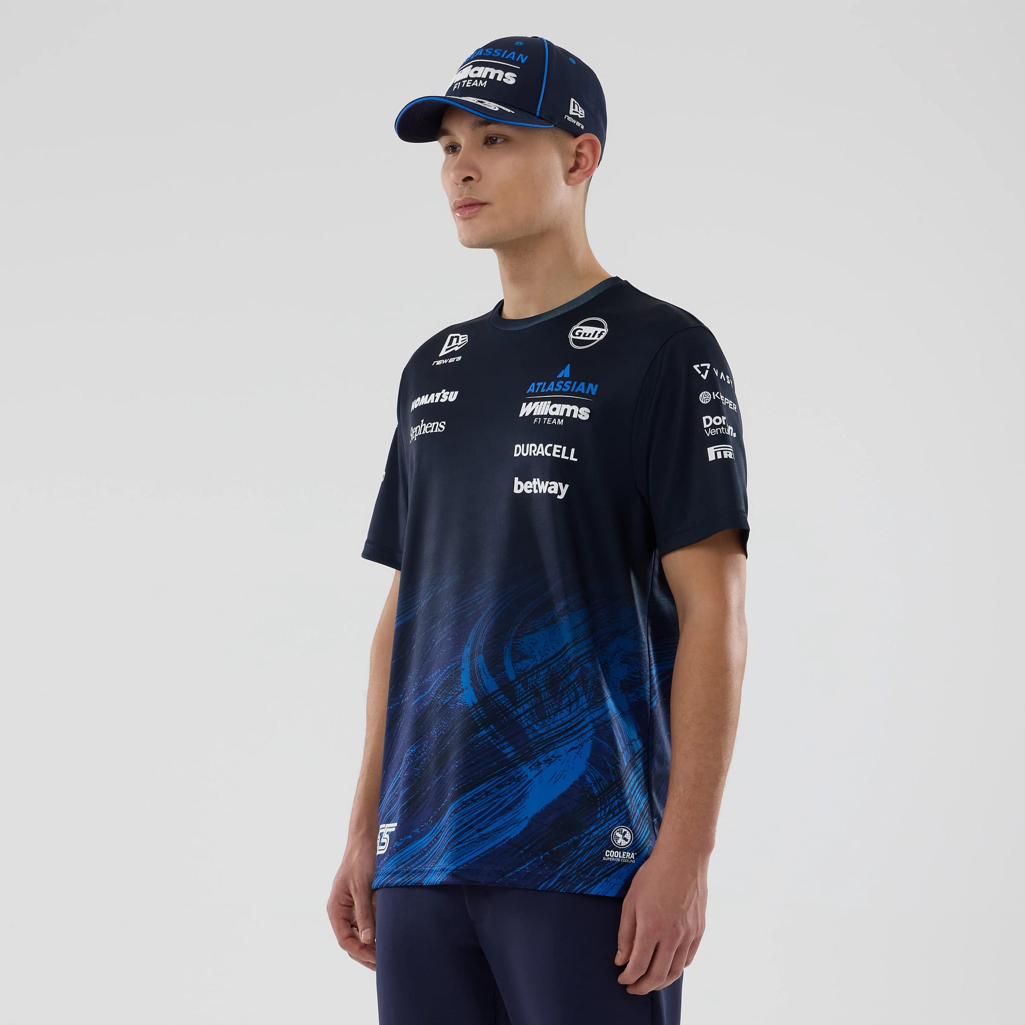 The model is wearing this Carlos Sainz Atlassian Williams F1 Team Tech T-shirt in navy. 3
