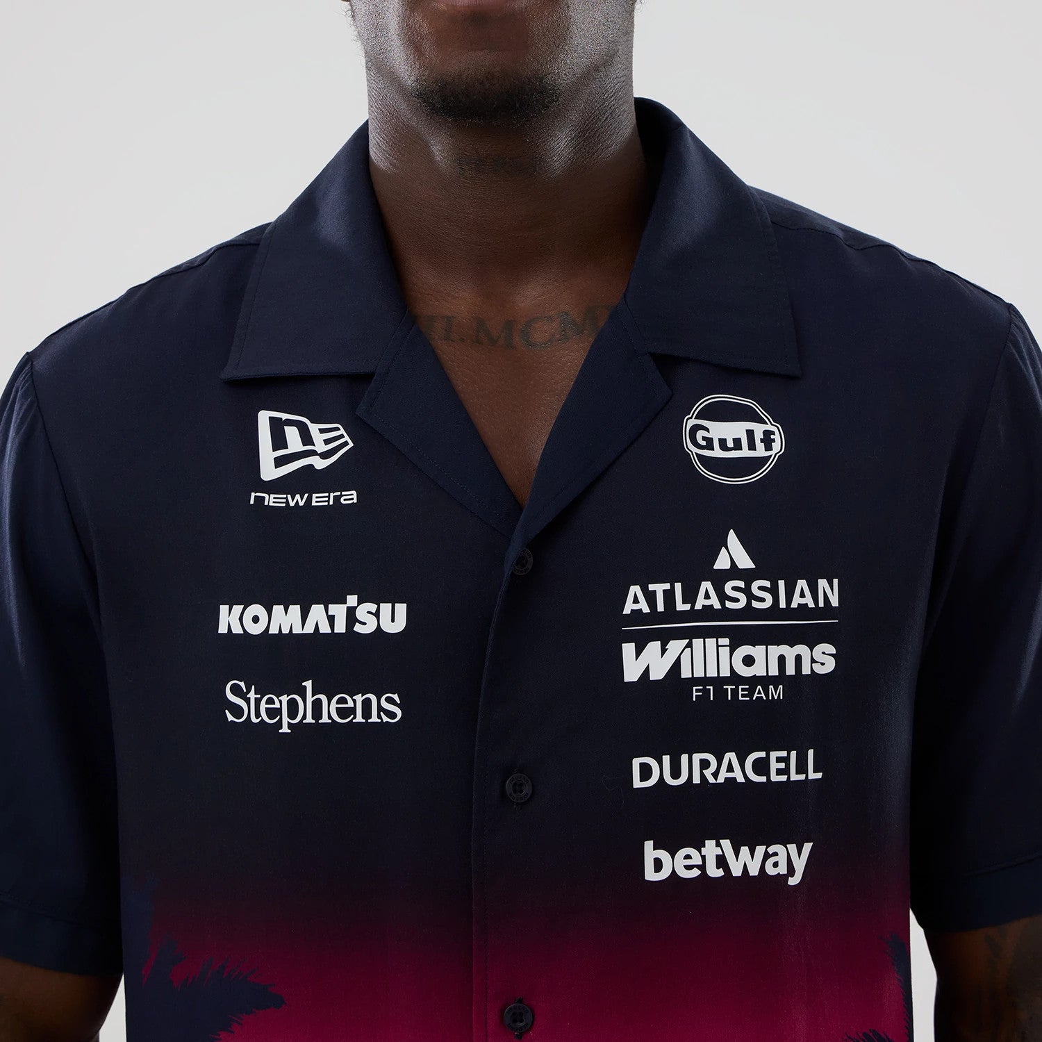 The model is wearing this Miami Atlassian Williams F1 Team Short Sleeve Shirt in navy. 3