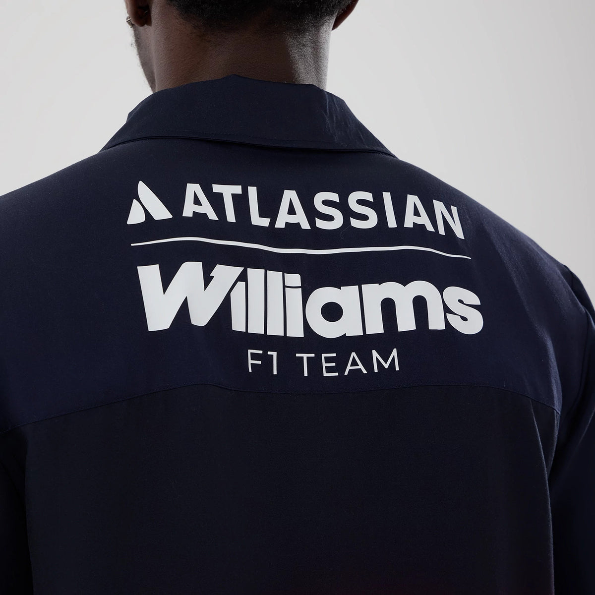 The model is wearing this Miami Atlassian Williams F1 Team Short Sleeve Shirt in navy. 7